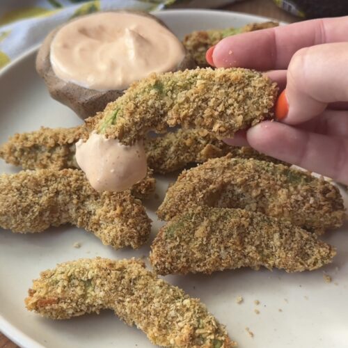 Air fryer avocado fries dipped in smoky ranch